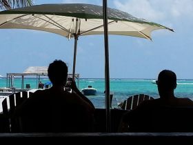 Enjoying the Caribbean during lunch, Ambergris Caye, Belize – Best Places In The World To Retire – International Living
